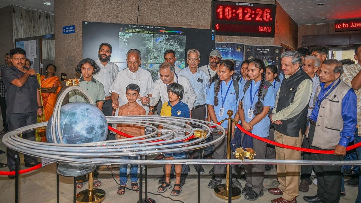 <div class="paragraphs"><p>NS Boseraju, Minister for Minor Irrigation and Science &amp;Technology Department, views exhibits at&nbsp;Jawaharlal Nehru Planetarium on Friday.</p></div>