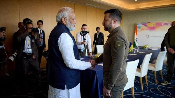 <div class="paragraphs"><p>Ukrainian President Volodymyr Zelenskyy and Indian Prime Minister Narendra Modi shake hands during the G7 leaders' summit in Hiroshima in May 2023.</p></div>