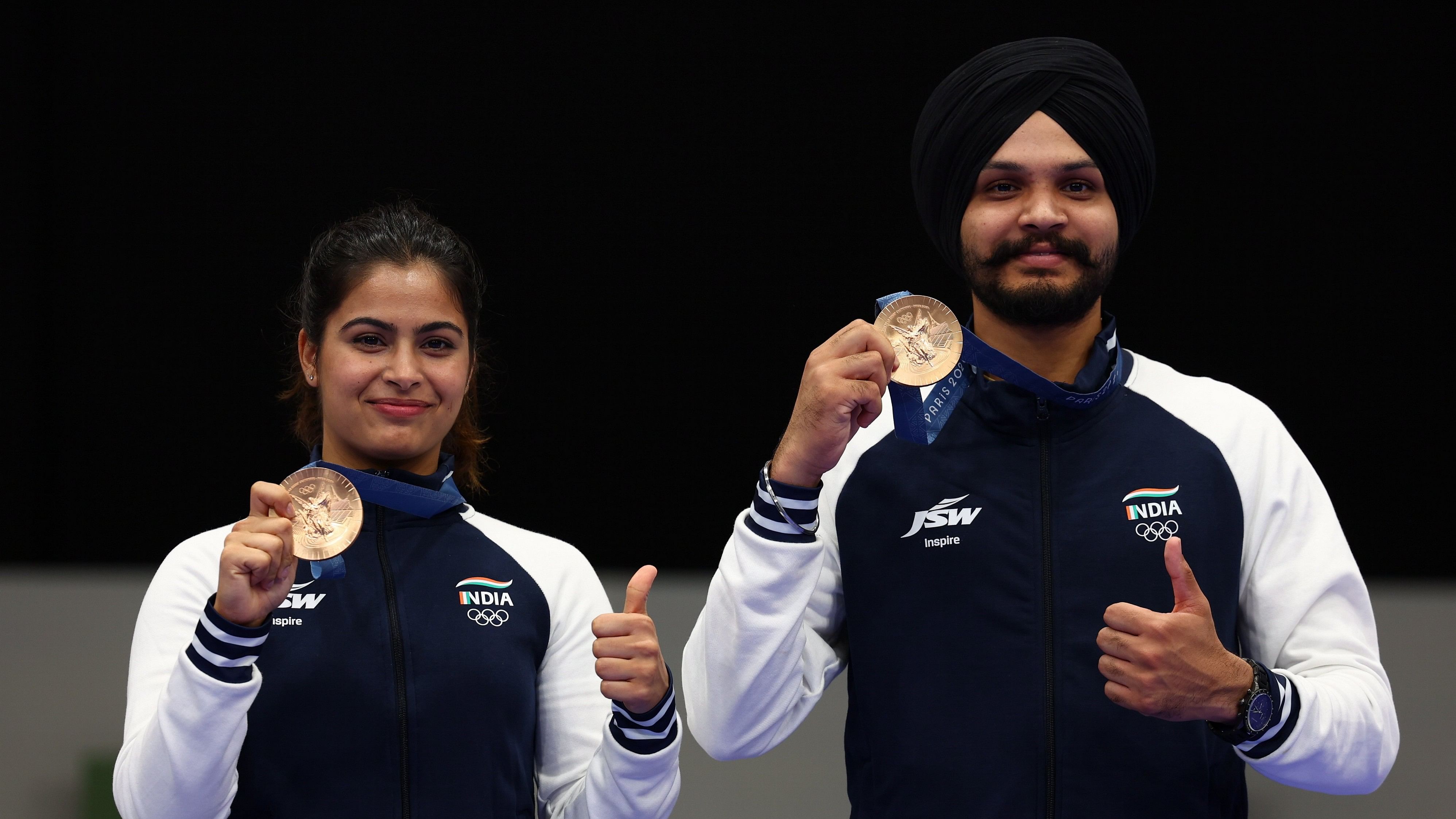 <div class="paragraphs"><p>The bronze medalists Manu Bhaker (L) and  Sarabjot Singh of India.</p></div>