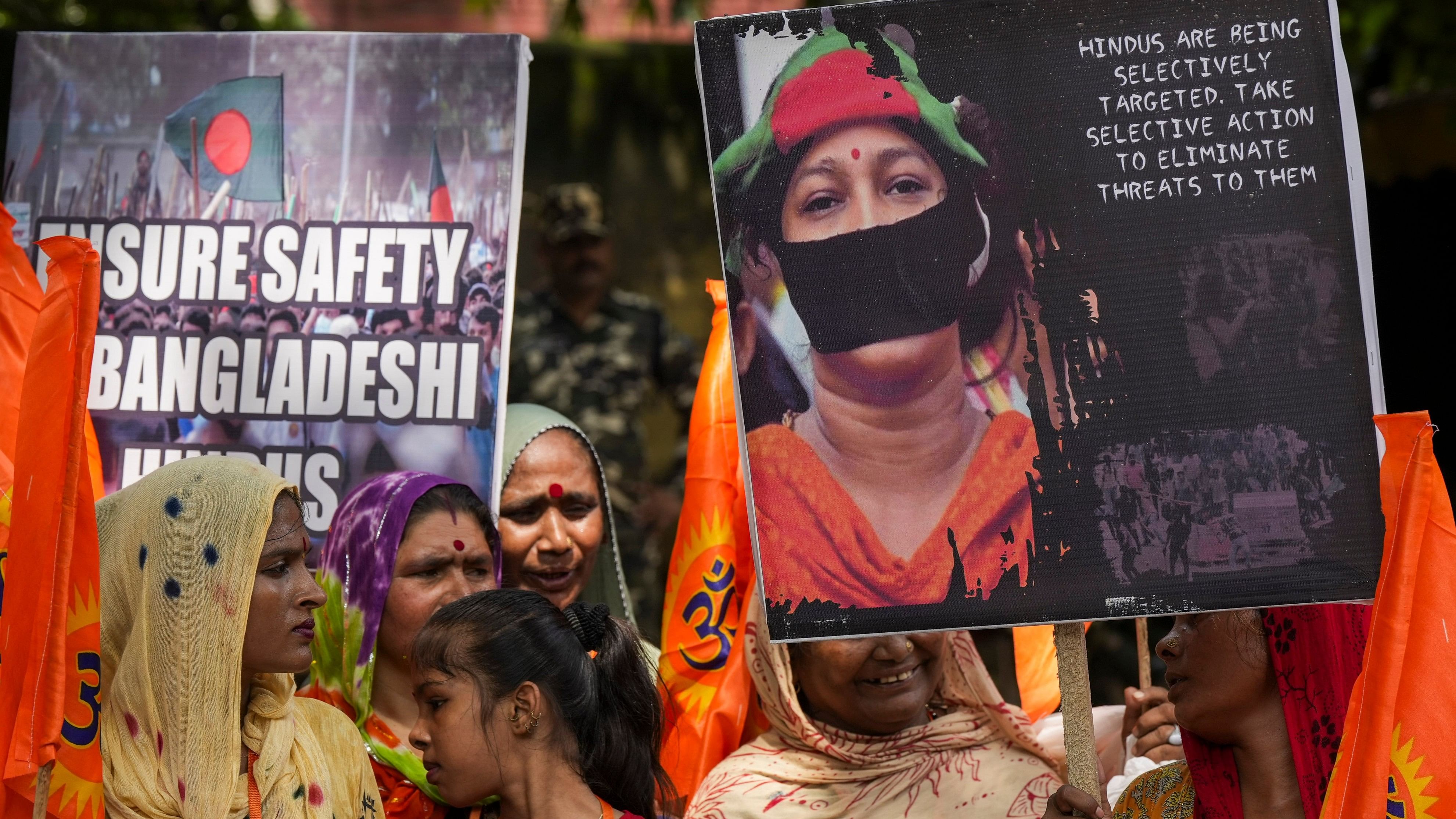 <div class="paragraphs"><p>Members of Hindu organisations protest over the violence against minorities in Bangladesh, at  Jantar Mantar in New Delhi, Sunday, Aug. 18, 2024. </p></div>