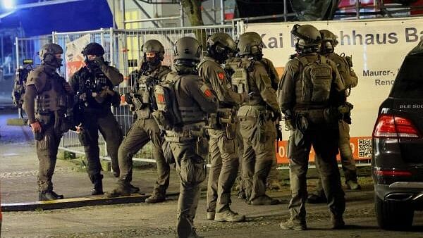 <div class="paragraphs"><p>Special police forces work following an incident in which several individuals were killed on Friday night when a man randomly stabbed passers-by with a knife at a city festival, in Solingen, Germany.</p></div>