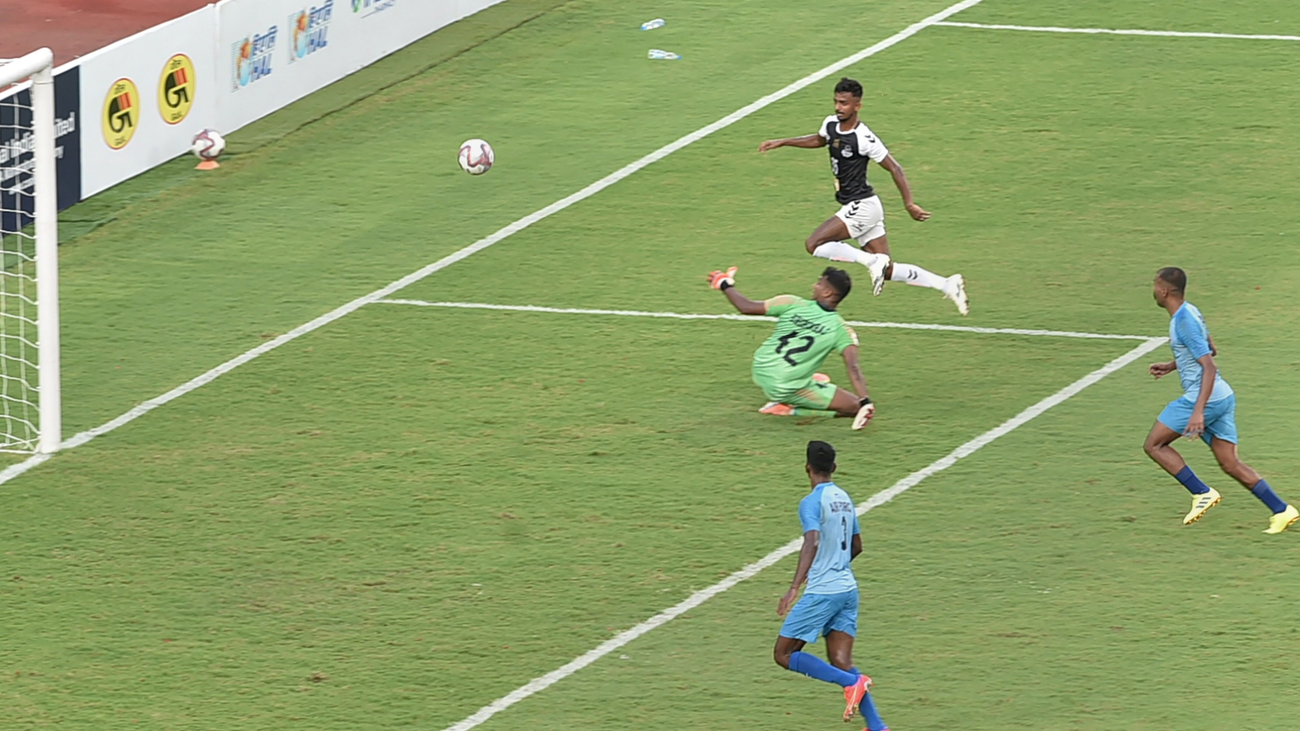 <div class="paragraphs"><p>Mohammedan Sporting Club forward Azharuddin Mallick (35) scores a goal against Indian Air Force during inaugural match of Durand Cup Tournament in Kolkata, Sunday, Sept 5, 2021.</p></div>