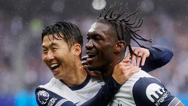 <div class="paragraphs"><p> Tottenham Hotspur's Yves Bissouma celebrates scoring their first goal with Son Heung-min&nbsp;during the English Premier League football match between Tottenham Hotspur and Everton at the Tottenham Hotspur Stadium in London, on August 24, 2024. </p></div>