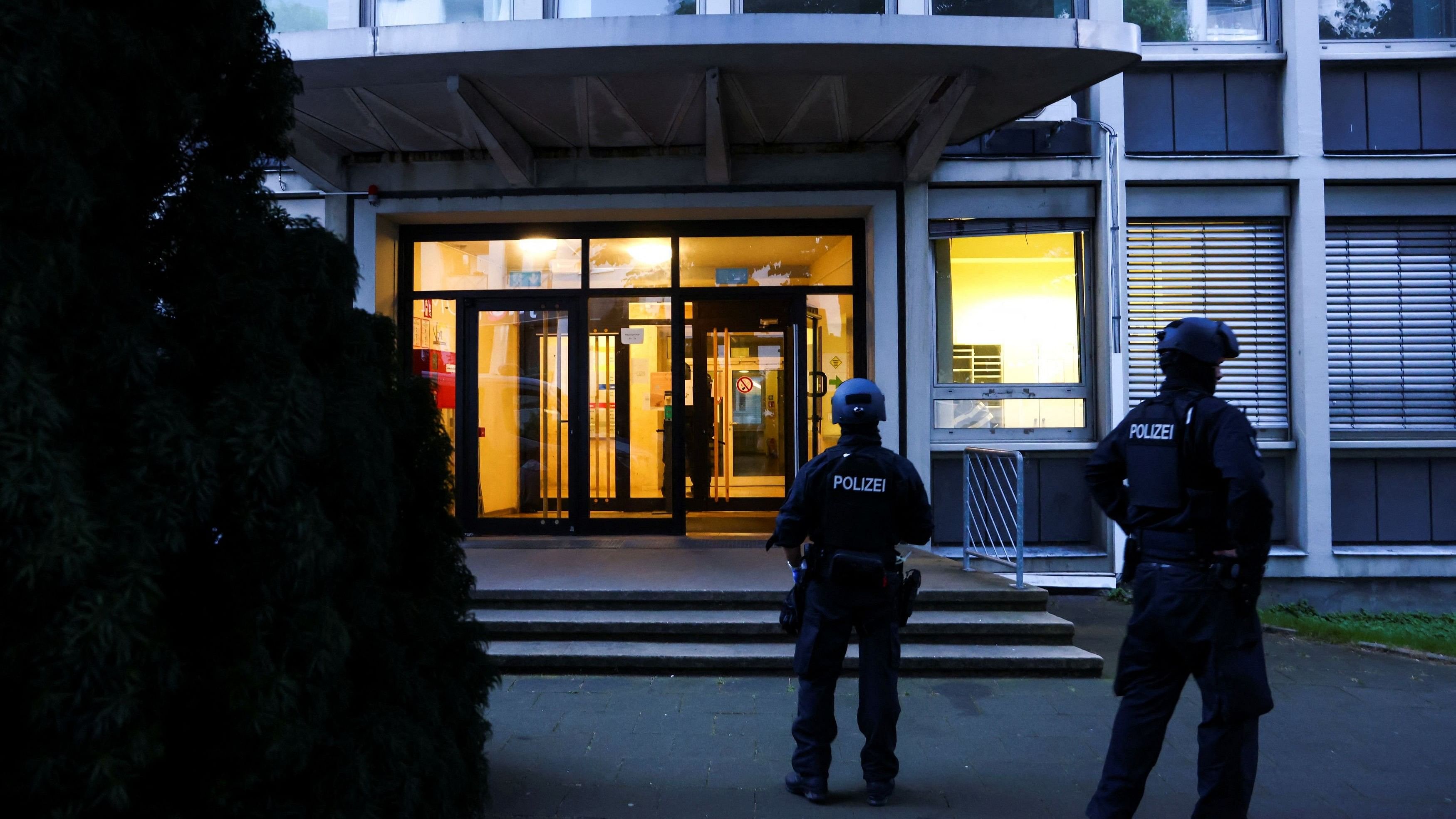 <div class="paragraphs"><p>Special police forces officers stand guard outside of a building, following an incident in which several individuals were killed after a man randomly stabbed passers-by with a knife at a city festival, in Solingen, Germany.</p></div>