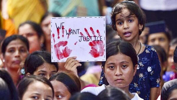 <div class="paragraphs"><p>Locals protest against an alleged gang-rape of a 14-year-old girl by three men at Dhing area, in Nagaon district.&nbsp;</p></div>