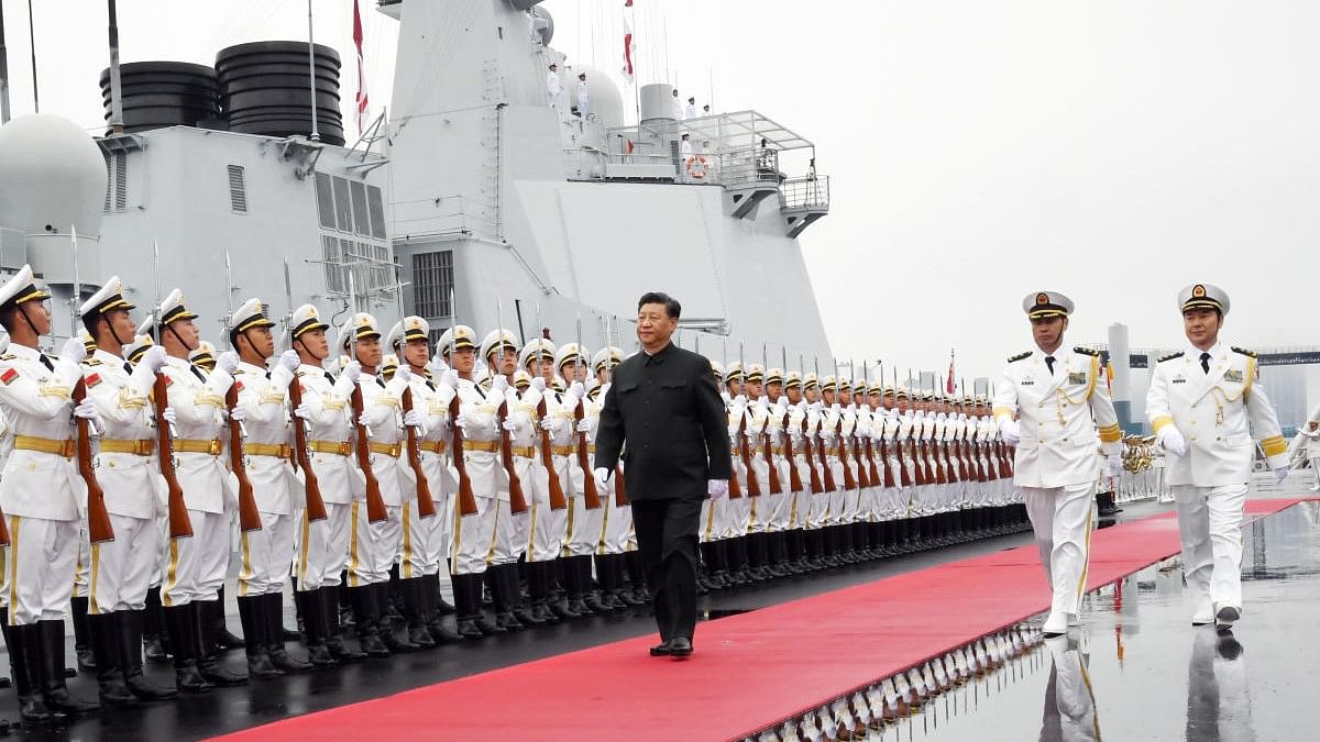 <div class="paragraphs"><p>Chinese President Xi Jinping reviews the honor guards of the Chinese People’s Liberation Navy.</p></div>