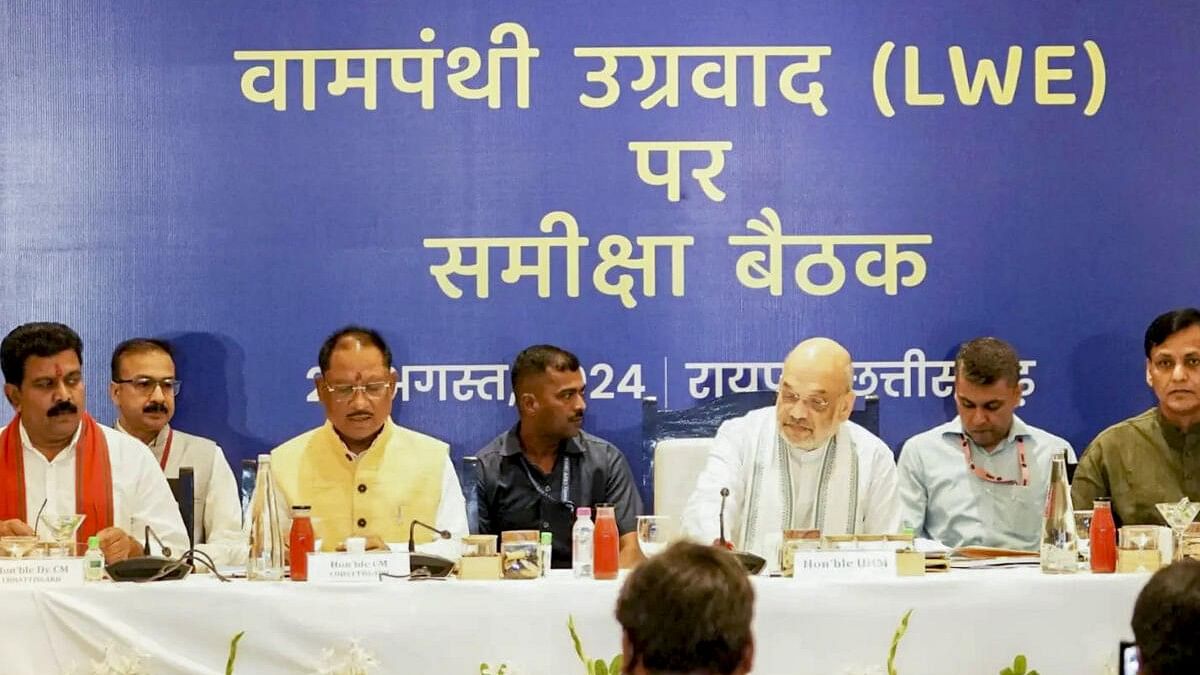 <div class="paragraphs"><p>Union Home Minister Amit Shah, Chhattisgarh Chief Minister Vishnu Deo Sai, Deputy Chief Minister Vijay Sharma and others during a meeting of the Inter-State Coordination Committee of Naxal-affected states.&nbsp;</p></div>