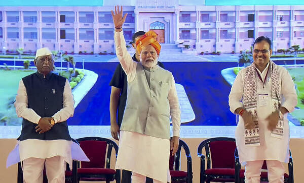 <div class="paragraphs"><p>Prime Minister Narendra Modi with Rajasthan Chief Minister Bhajan Lal Sharma during the concluding ceremony of Rajasthan High Court's platinum jubilee celebrations, in Jodhpur, Sunday, Aug 25, 2024.</p></div>