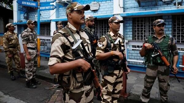 <div class="paragraphs"><p>Central Industrial Security Force (CISF) personnel stand guard inside the premises of R G Kar Medical College and Hospital in Kolkata.</p></div>