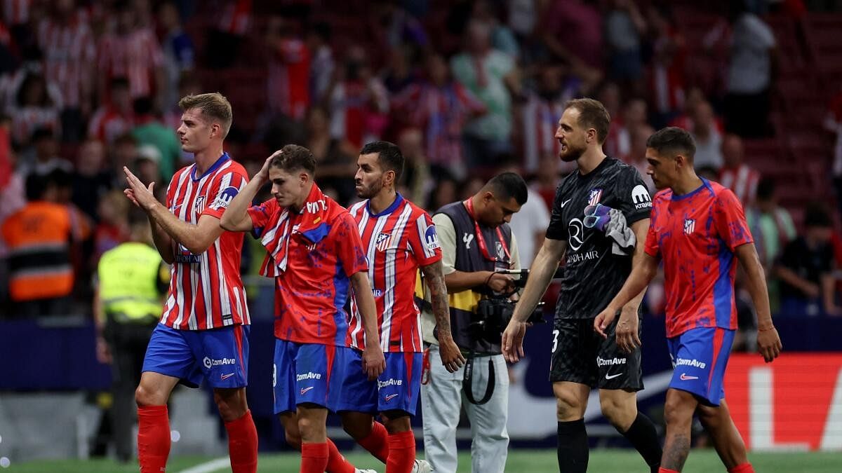 <div class="paragraphs"><p>Atletico Madrid players applaud their fans after the match.</p></div>