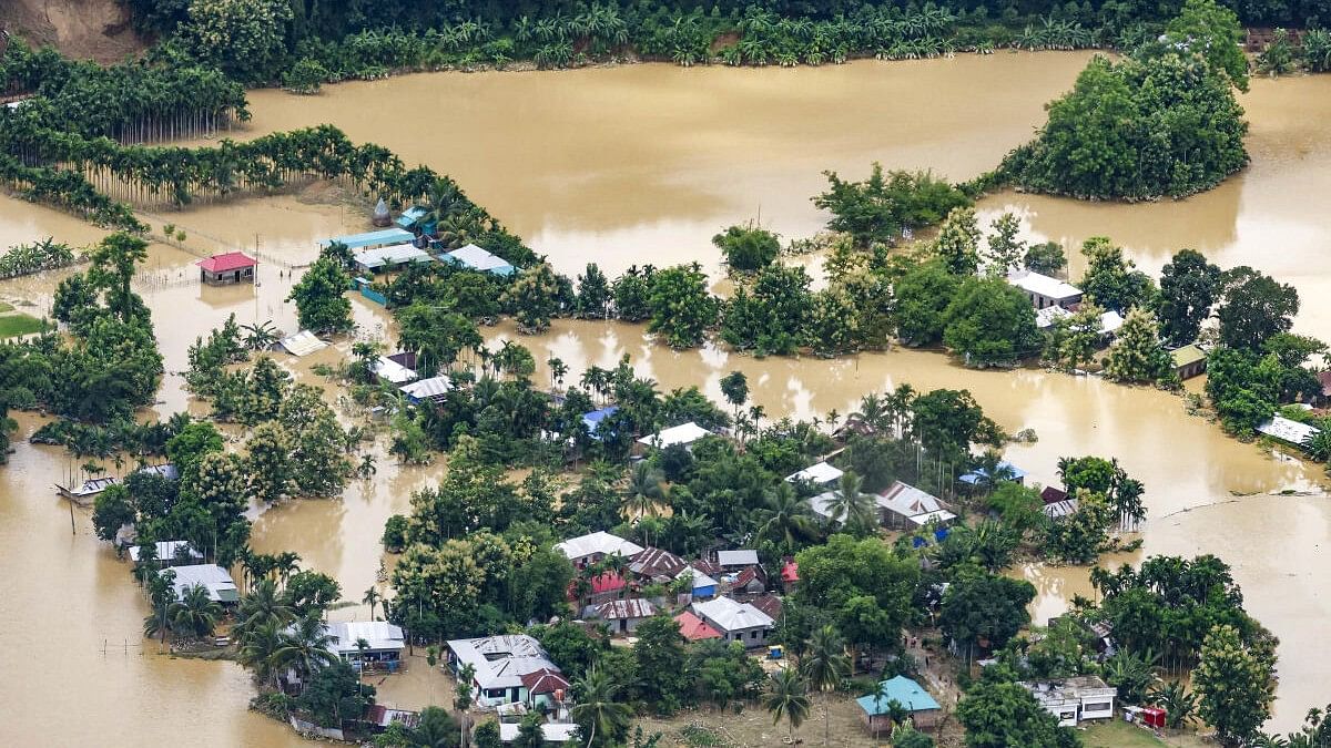 <div class="paragraphs"><p> A view of the flood-affected areas in Tripura from a chopper.</p></div>