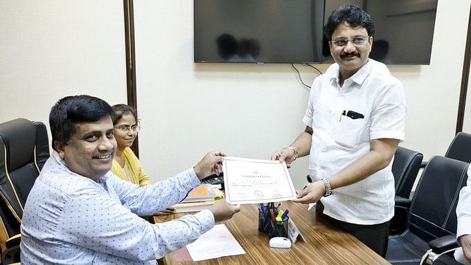 <div class="paragraphs"><p>Nitin Patil receiving official letter of Rajya Sabha membership from Chief Electoral Returning Officer at Vidhan Bhavan Mumbai.</p></div>