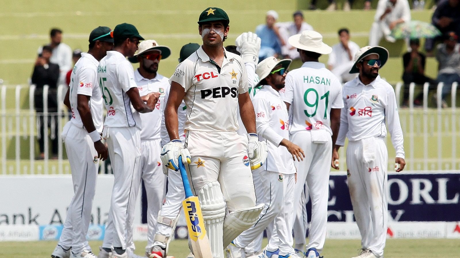 <div class="paragraphs"><p>Bangladesh players celebrate after bowling out Pakistan for 146.</p></div>