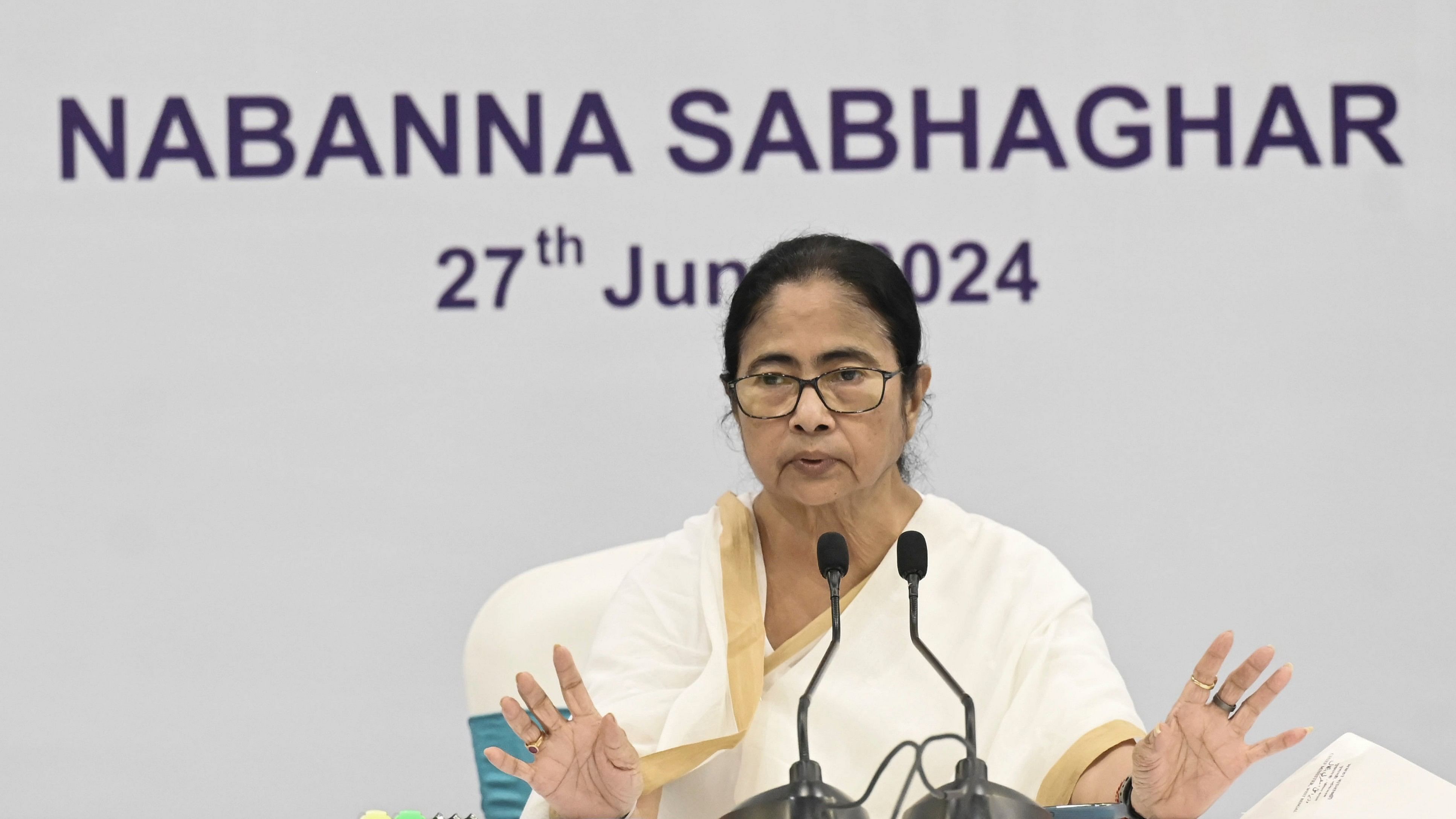 <div class="paragraphs"><p>In this file photo, West Bengal Chief Minister Mamata Banerjee is shown chairing a meeting at Nabanna, in Howrah district</p></div>