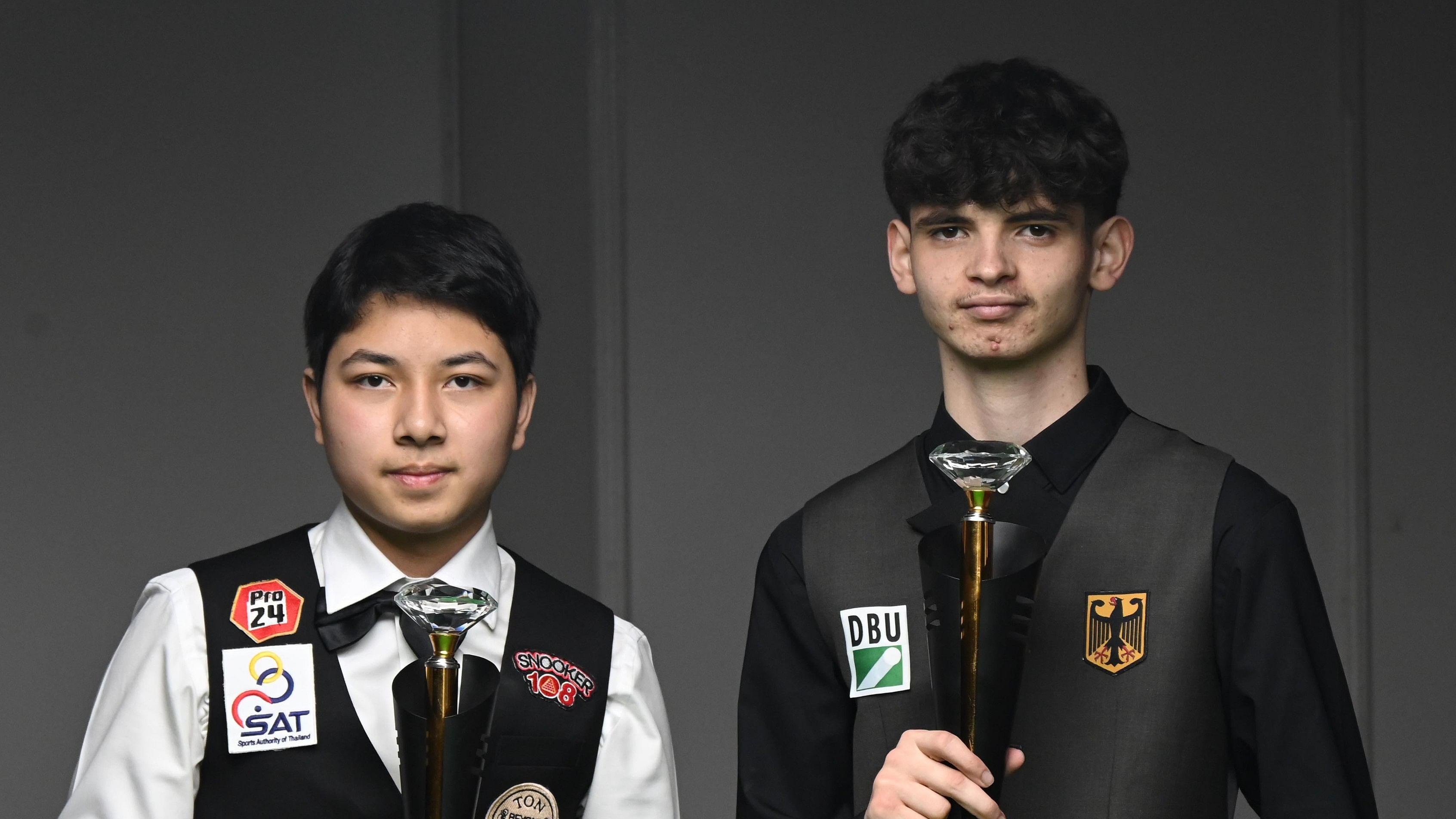 <div class="paragraphs"><p>Champion Christian Richter (right) of Germany and runner-up Lomnaw Issarangkun of Thailand pose after their final of the IBSF World Under 17 Boys' Snooker Championships at the KSBA in Bengaluru on Tuesday. </p></div>