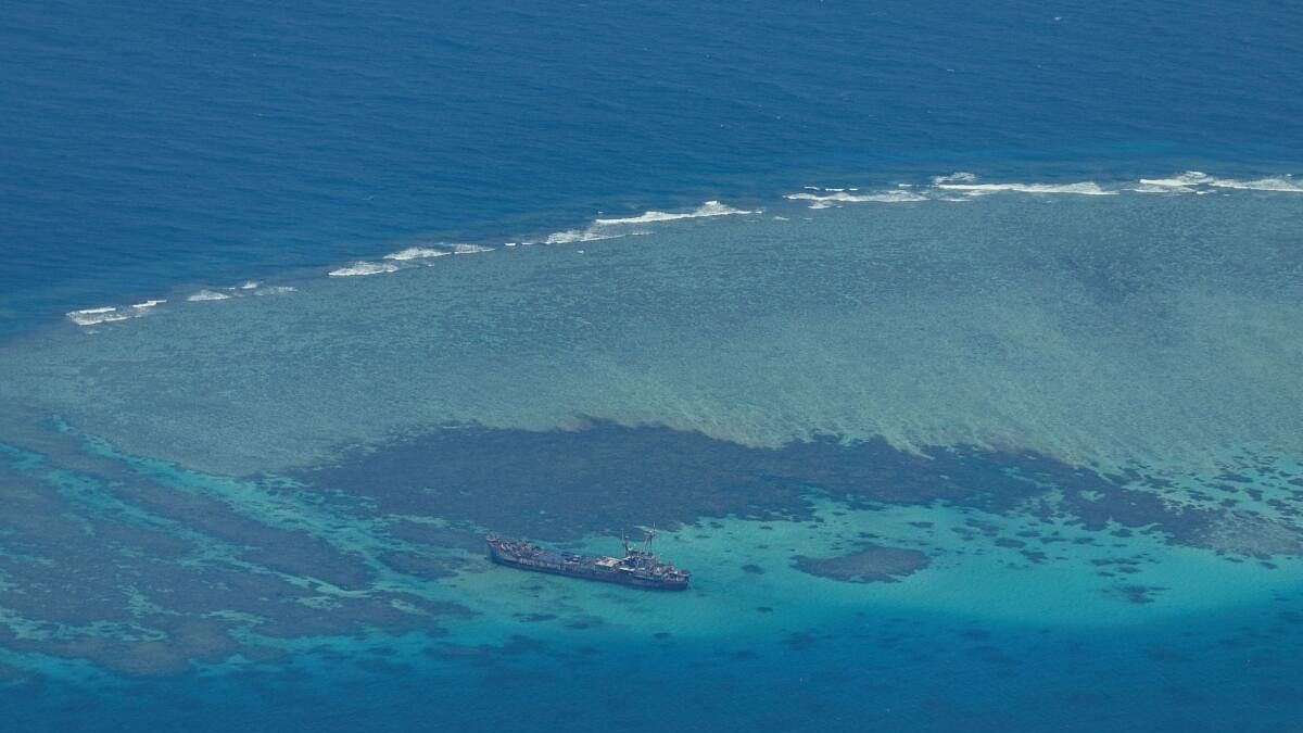 <div class="paragraphs"><p>Philippine Coast Guard flyby over the South China Sea.</p></div>