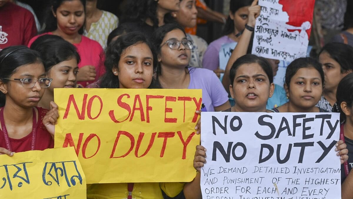 <div class="paragraphs"><p>Doctors and nursing staff protest against the recent the rape and murder of a woman doctor inside the RG Kar Medical College and Hospital, in Kolkata.&nbsp;</p></div>