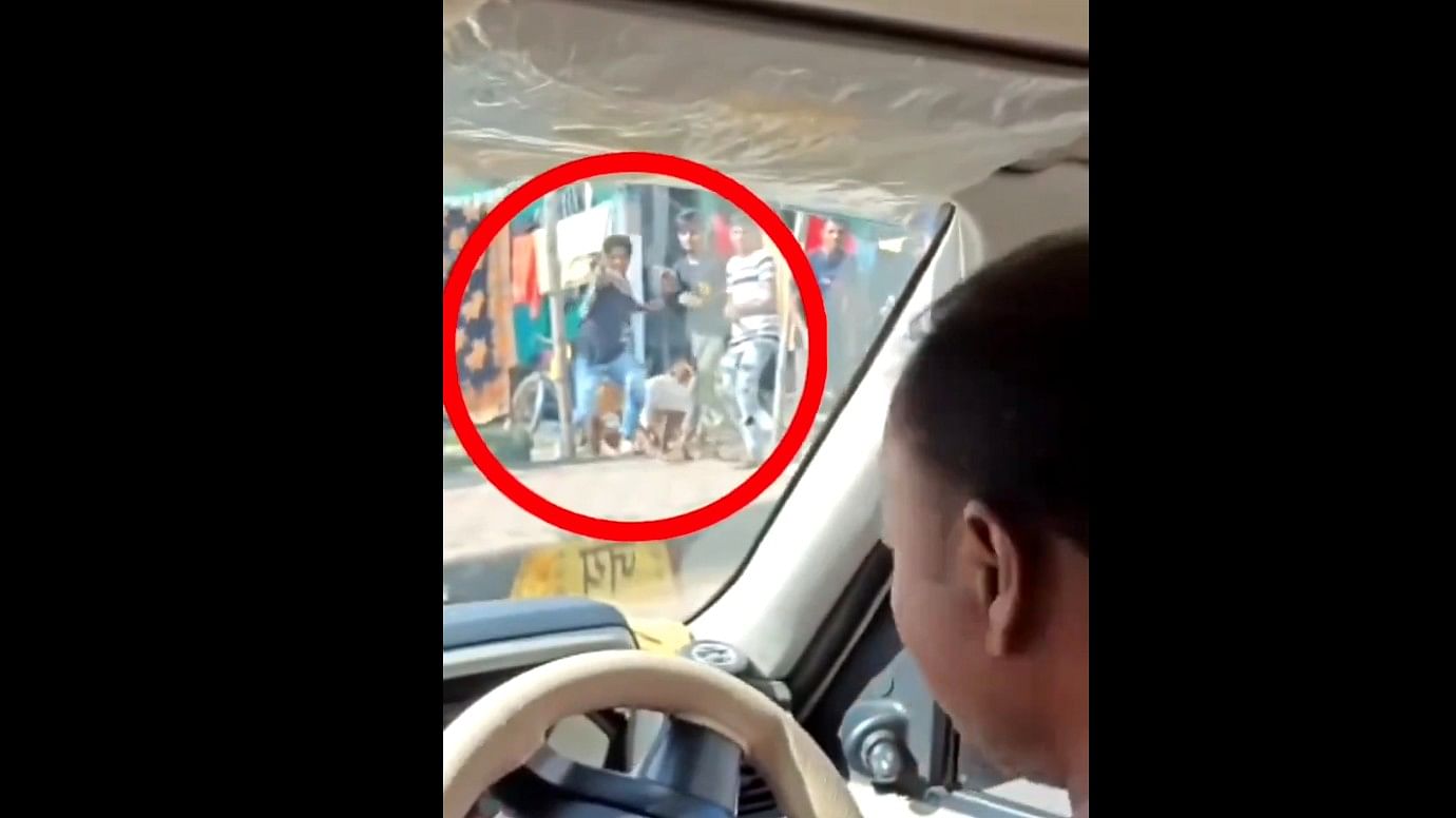 <div class="paragraphs"><p>The man in the red circle fired at the car from which this video has been taken. <em>DH</em> has not independently verified the authenticity of the video.</p></div>