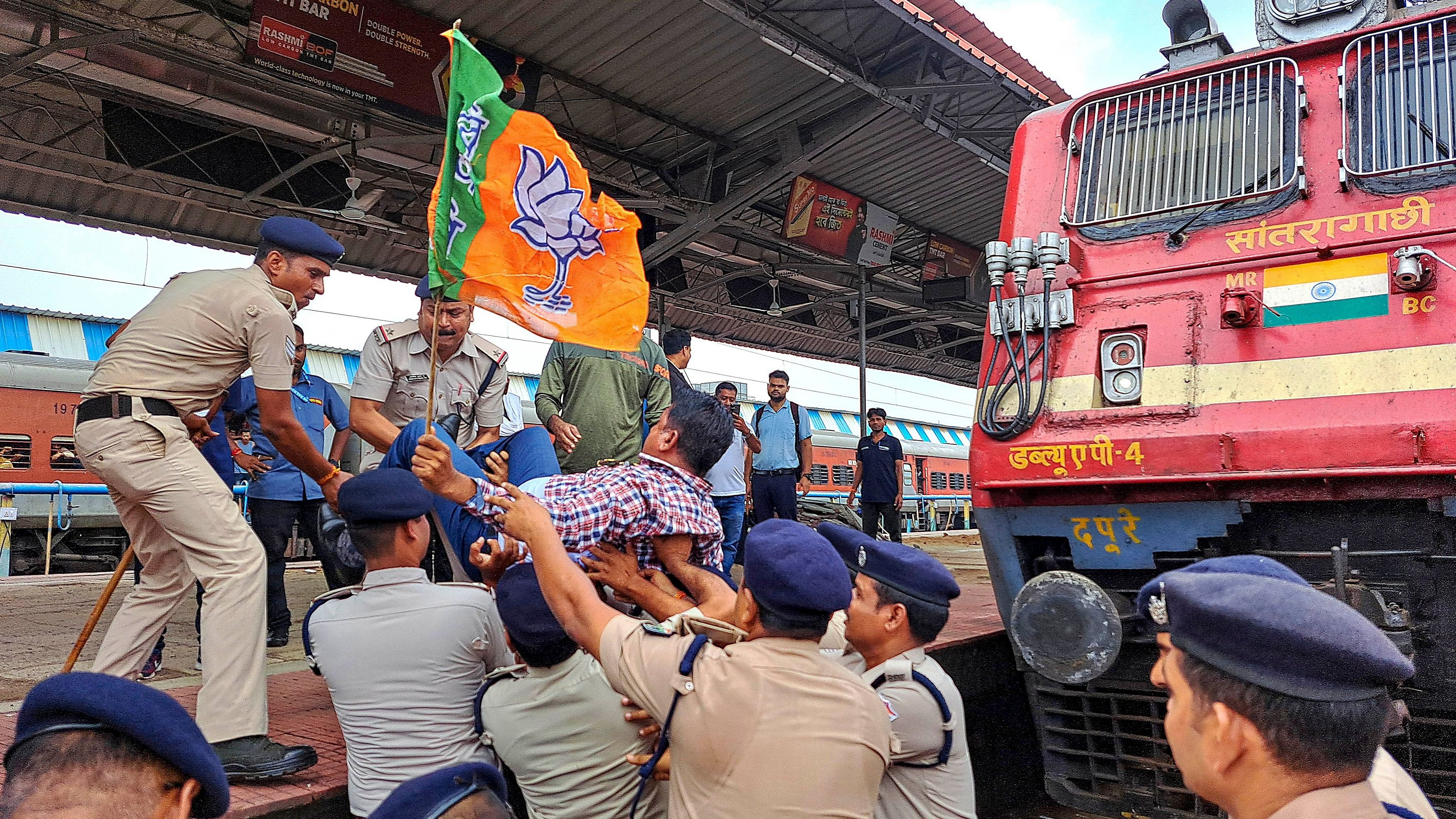 <div class="paragraphs"><p>West Medinipur: Police personnel detain a BJP worker as party activists block trains at Kharagpur railway station during the party's 12-hour general strike in Bengal to protest the police action against participants of Tuesday's Nabanna Abhijanrally which was held against the Kolkata RG Kar incident, in West Medinipur, Wednesday, Aug. 28, 2024. </p></div>