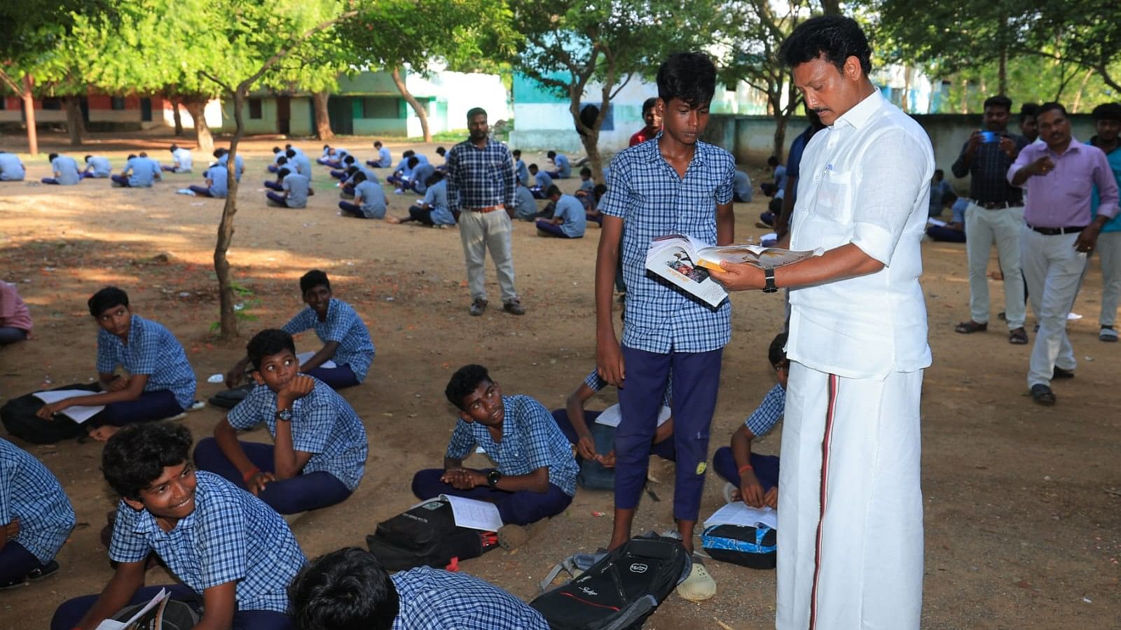 <div class="paragraphs"><p>Tamil Nadu Education Minister Anbil Mahesh Poyyamozhi interacts with school students.</p></div>