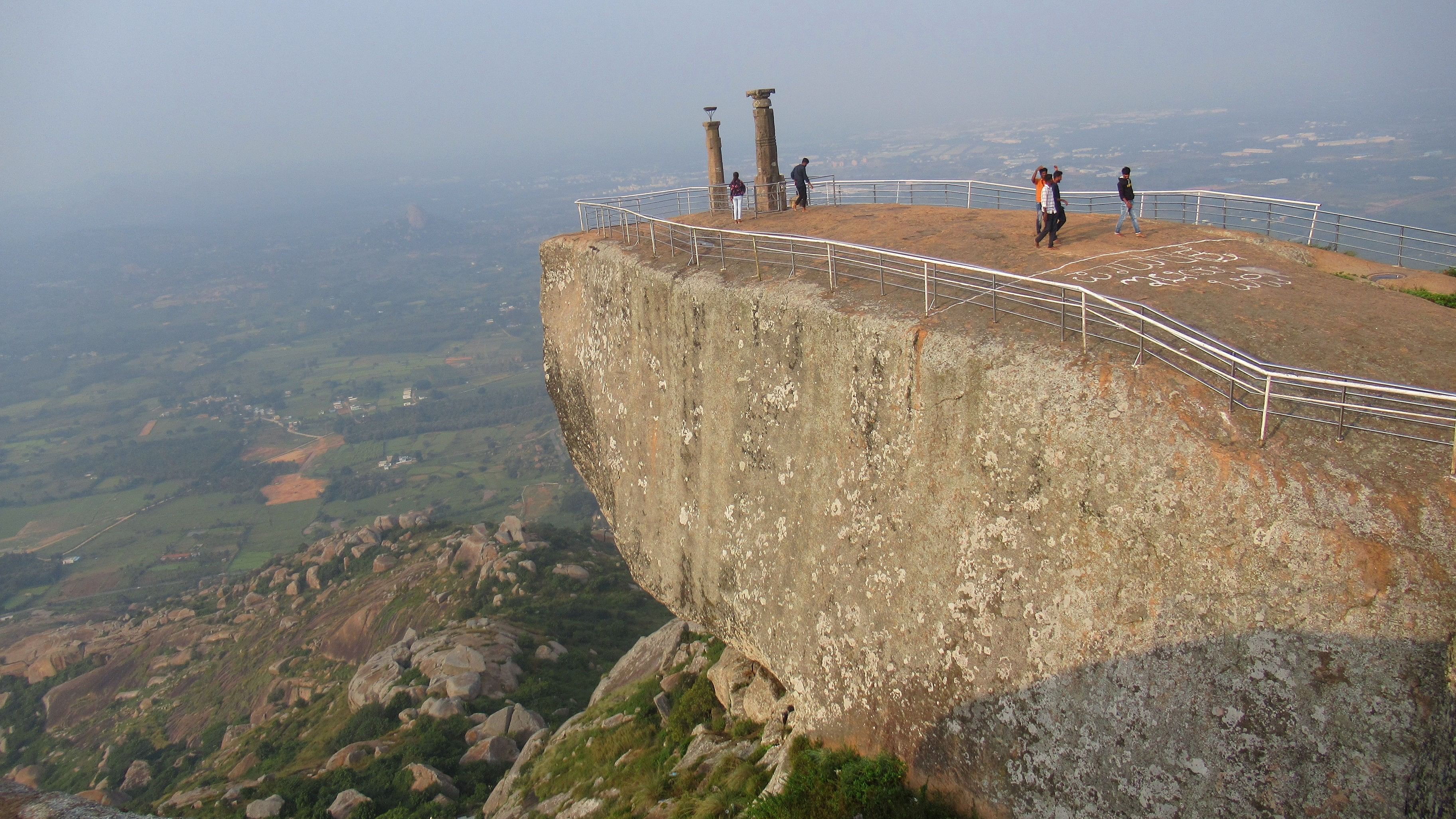 <div class="paragraphs"><p>Two stone pillars at the pinnacle of Shivagange hill; (below) a hero stone at Kambalu village.</p></div>