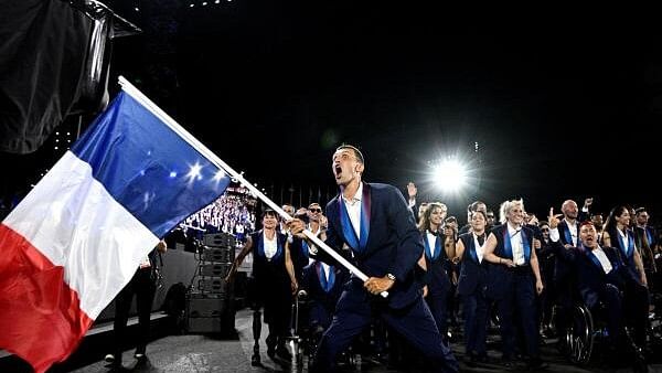 <div class="paragraphs"><p>France's paralympic flag bearer Alexis Hanquinquant reacts during the Parade of Nations, as part of the Paris 2024 Paralympic Games Opening Ceremony at the Place de la Concorde Julien De Rosa.</p></div>