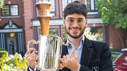 <div class="paragraphs"><p>Alireza Firouzja with his trophy.</p></div>