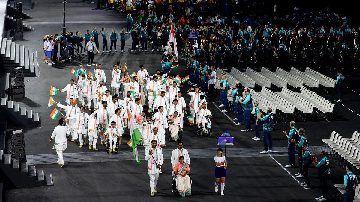 <div class="paragraphs"><p>Bhagyashri Mahavrao Jadhav and Sumit of India lead their contingent during the opening ceremony of Paralympics in Paris on August 28, 2024.</p></div>