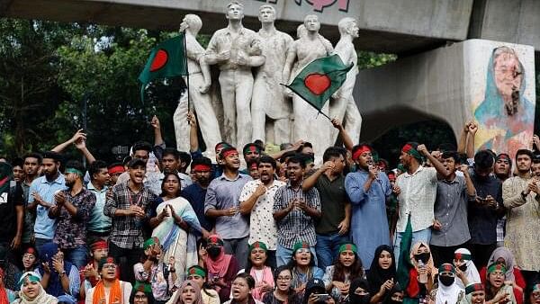 <div class="paragraphs"><p> Activists of the Anti-Discriminatory Student Movement gather at the University of Dhaka's Teacher Student Center (TSC), demanding the capital punishment for Bangladeshi former Prime Minister Sheikh Hasina for the deaths of students during anti-quota protests, in Dhaka, Bangladesh.</p></div>