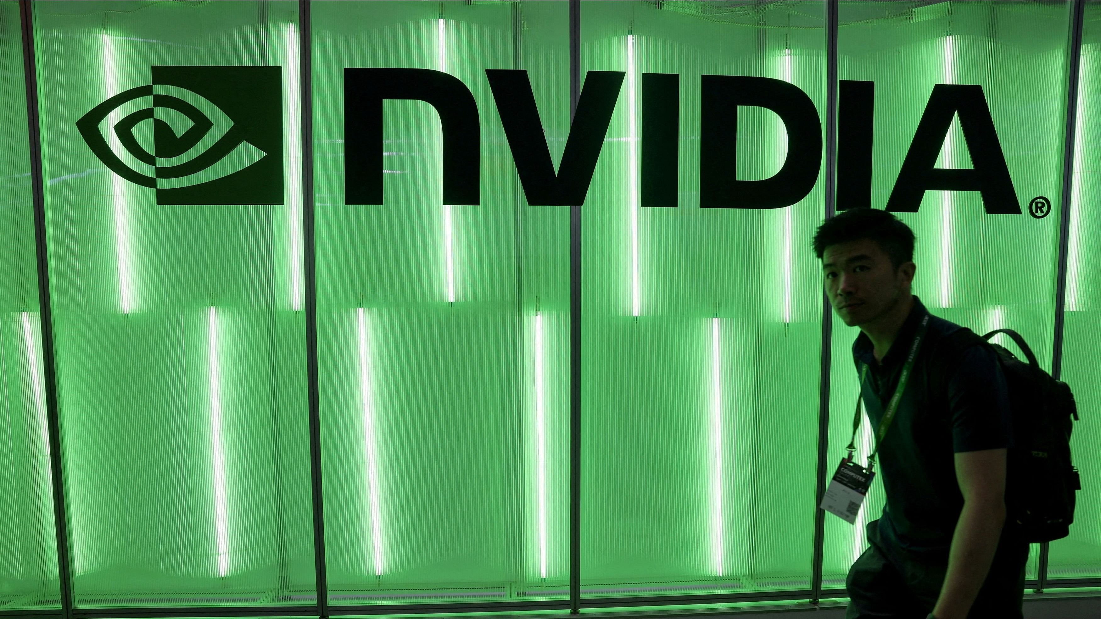 <div class="paragraphs"><p>A person walks pass a Nvidia logo.</p></div>