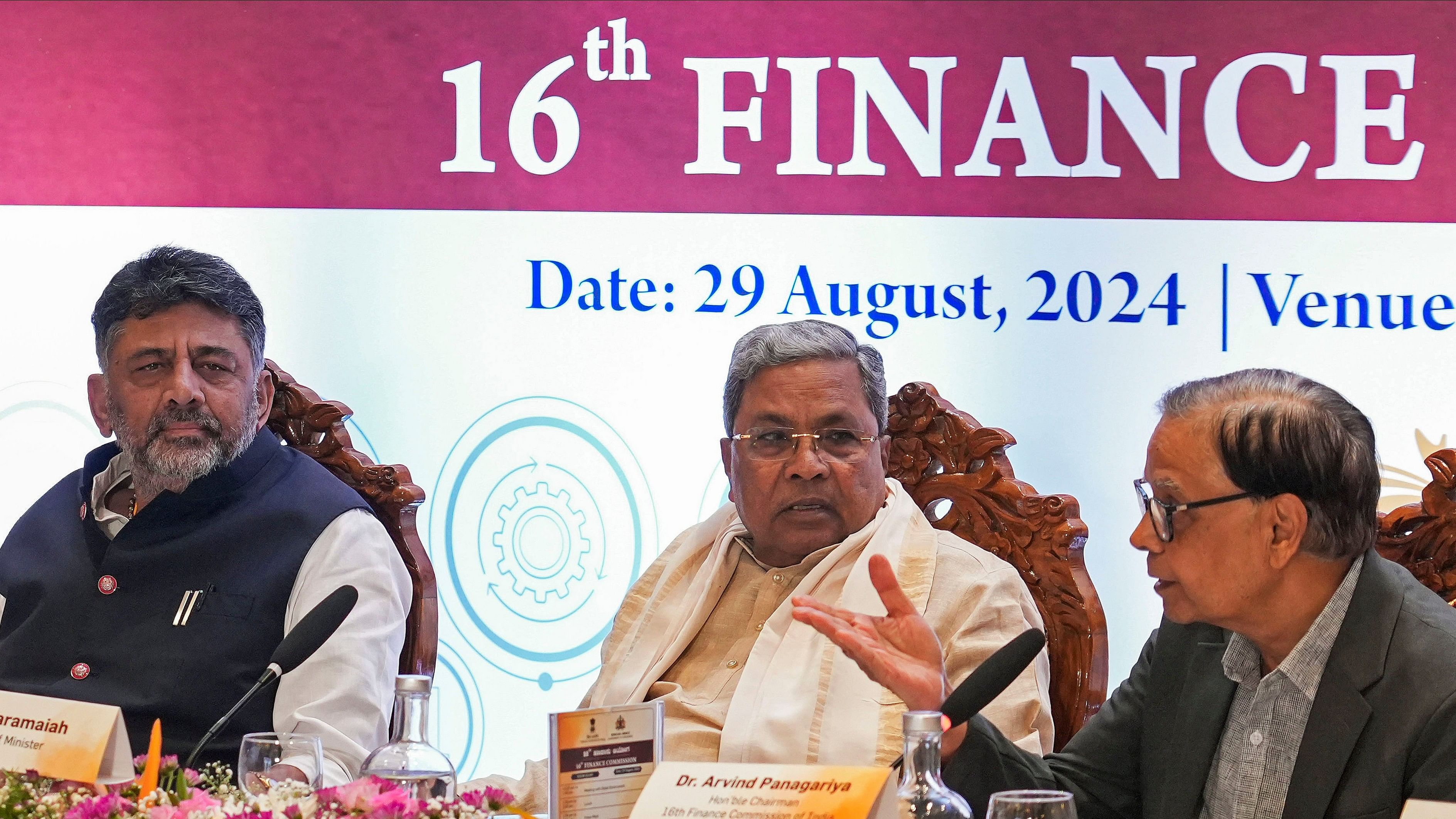 <div class="paragraphs"><p>Chief Minister Siddaramaiah and Deputy Chief Minister D K Shivakumar with Chairman of 16th Finance Commission Arvind Panagariya during a meeting in Bengaluru on Thursday. </p></div>