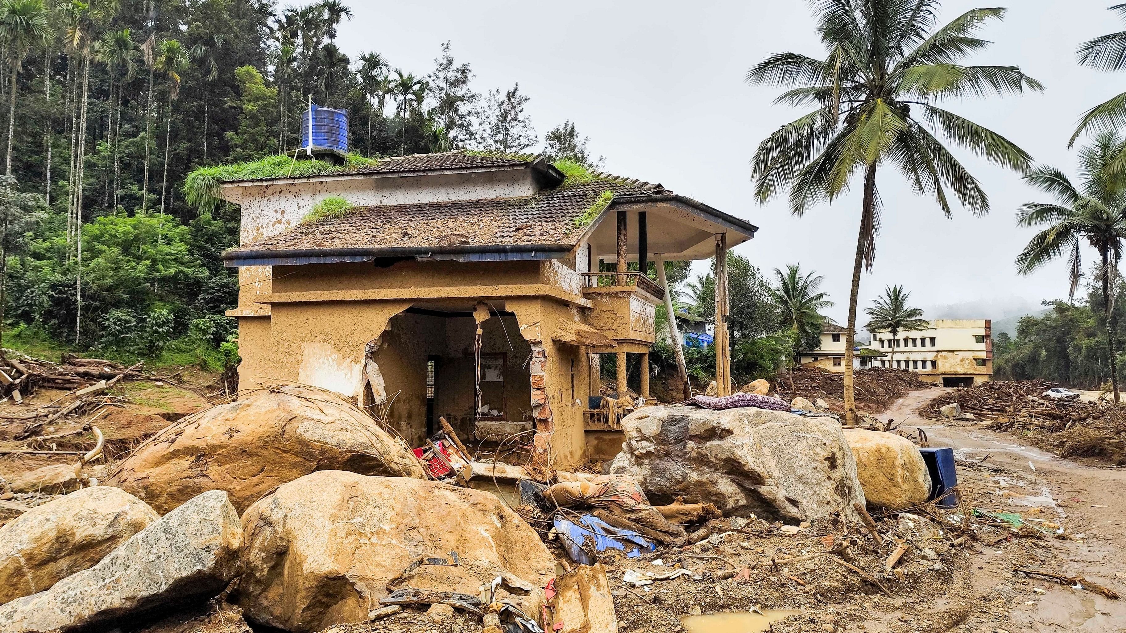 <div class="paragraphs"><p> Damaged houses and the terrain in the Chooralmala village a month after the Wayanad landslides disaster that struck Kerala on July 30. </p></div>