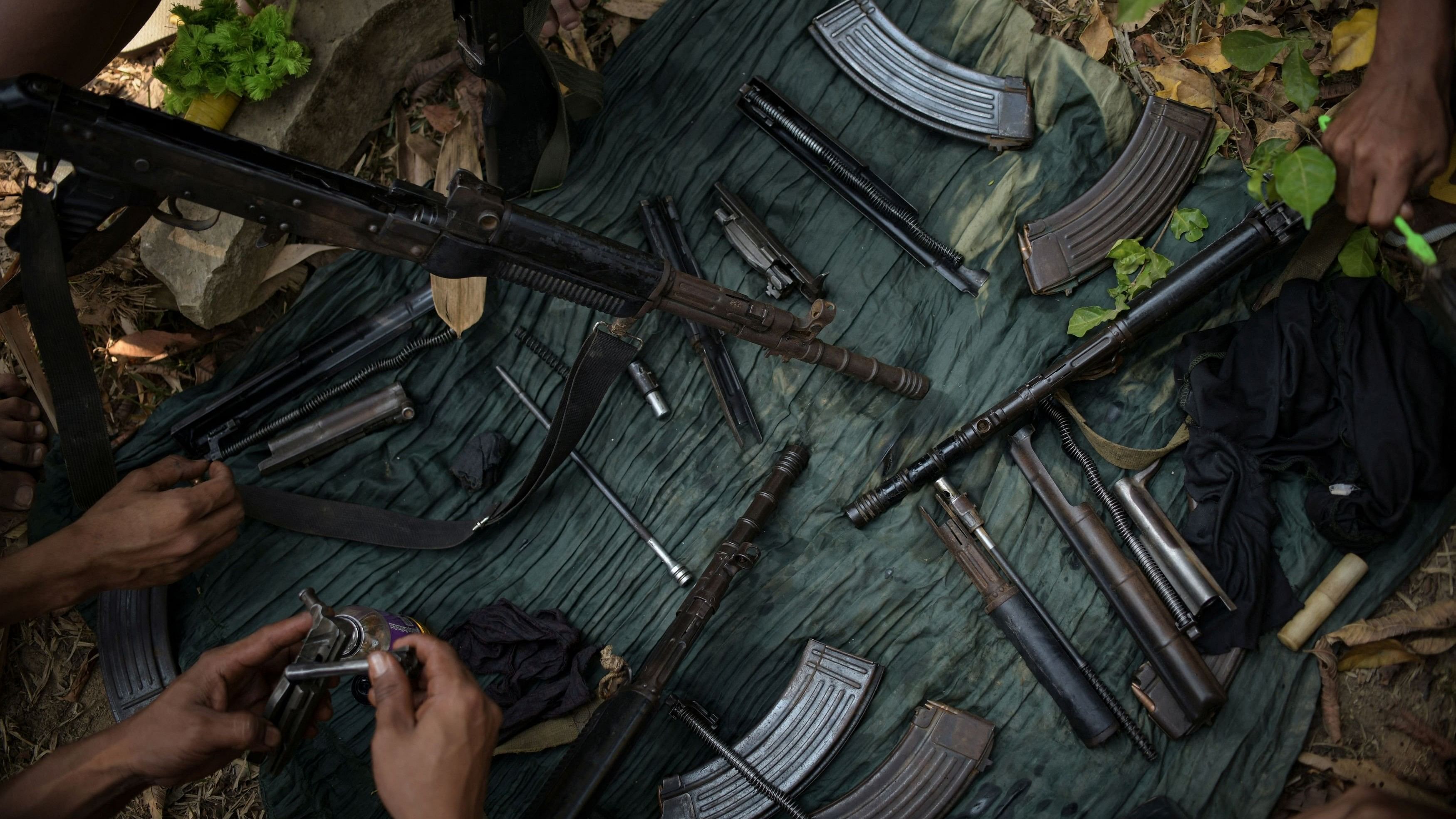 <div class="paragraphs"><p>Representative image of seized arms and ammunition</p></div>