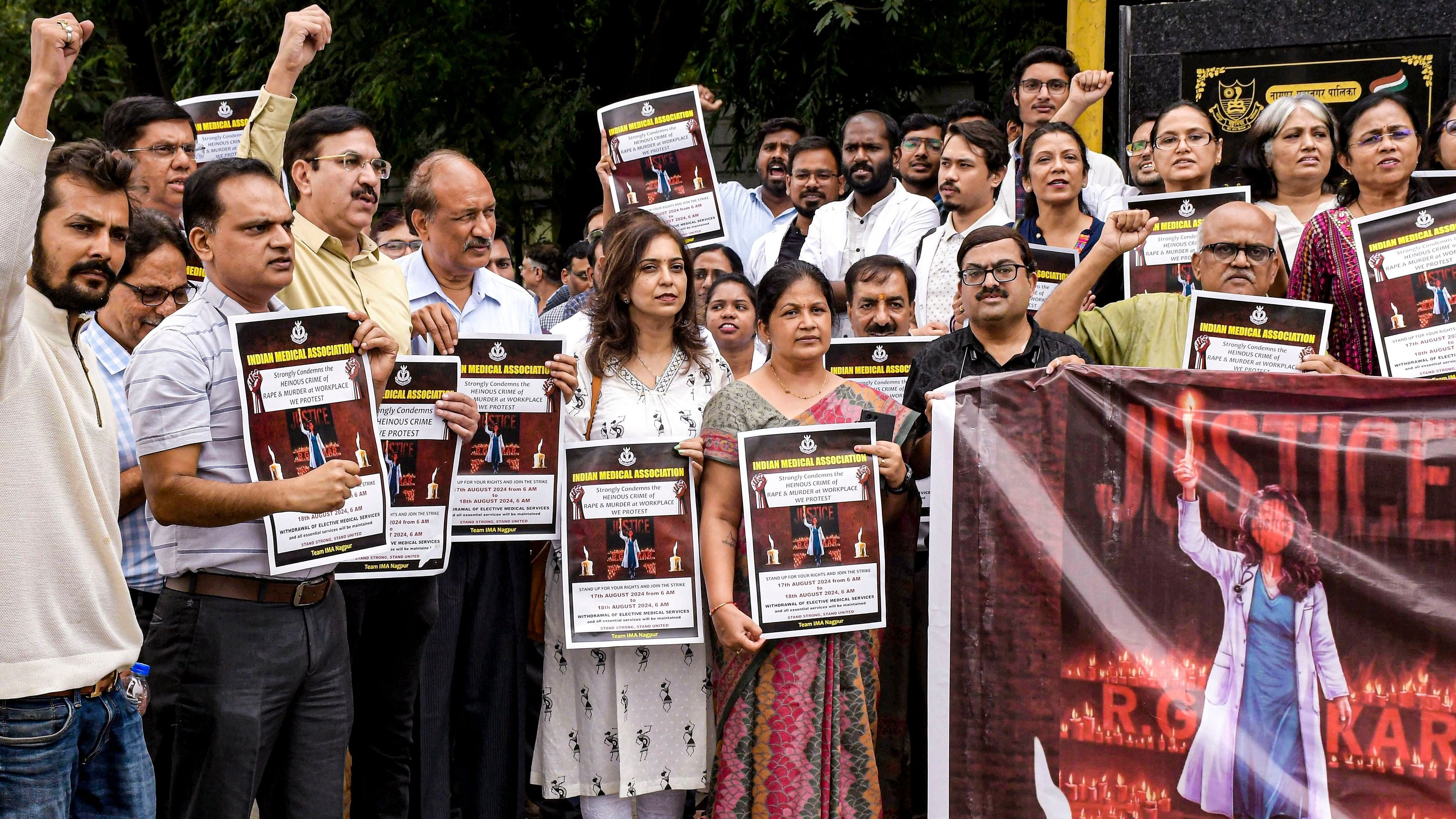 <div class="paragraphs"><p>Members of the Indian Medical Association (IMA) and Maharashtra State Association of Resident Doctors (MARD) stage a protest amid IMA's 24-hour nationwide strike demanding justice for the woman doctor who was allegedly raped and murdered at Kolkata's R G Kar Medical College and Hospital.</p></div>