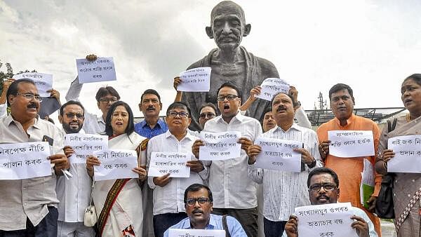 <div class="paragraphs"><p>Congress legislators stage a protest during the ongoing Autumn session of the Assam Legislative Assembly, in Guwahati.</p></div>