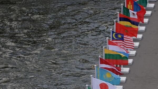 <div class="paragraphs"><p> The flags of various countries are seen along the River Seine.</p></div>