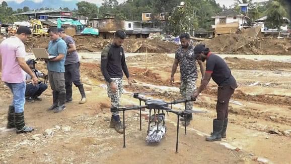 <div class="paragraphs"><p>Officials use drone based detectors to search bodies at landslide-hit Chooralmala area, in Wayanad district, Sunday, Aug. 4, 2024.</p></div>