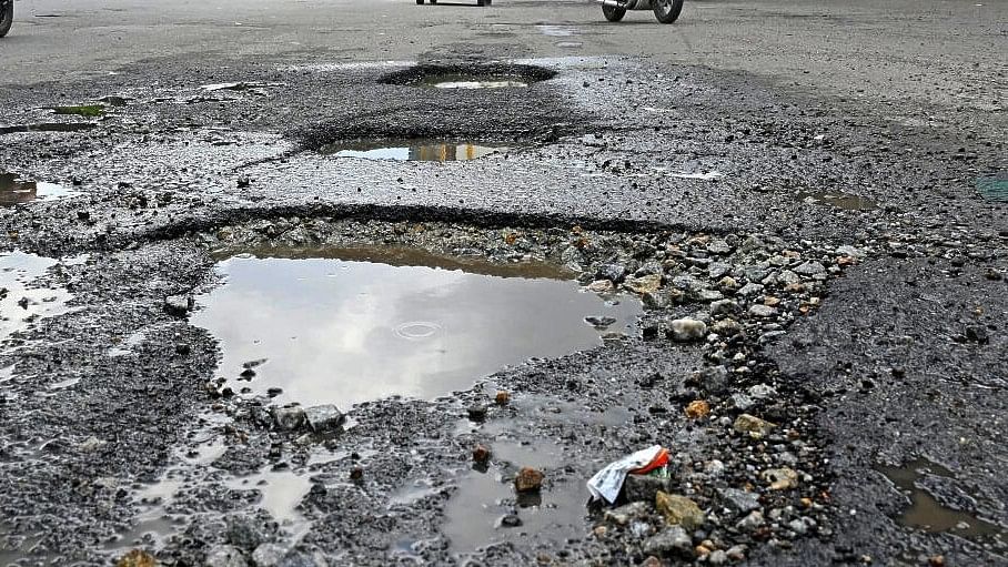 <div class="paragraphs"><p>Representative image showing a pothole.</p></div>