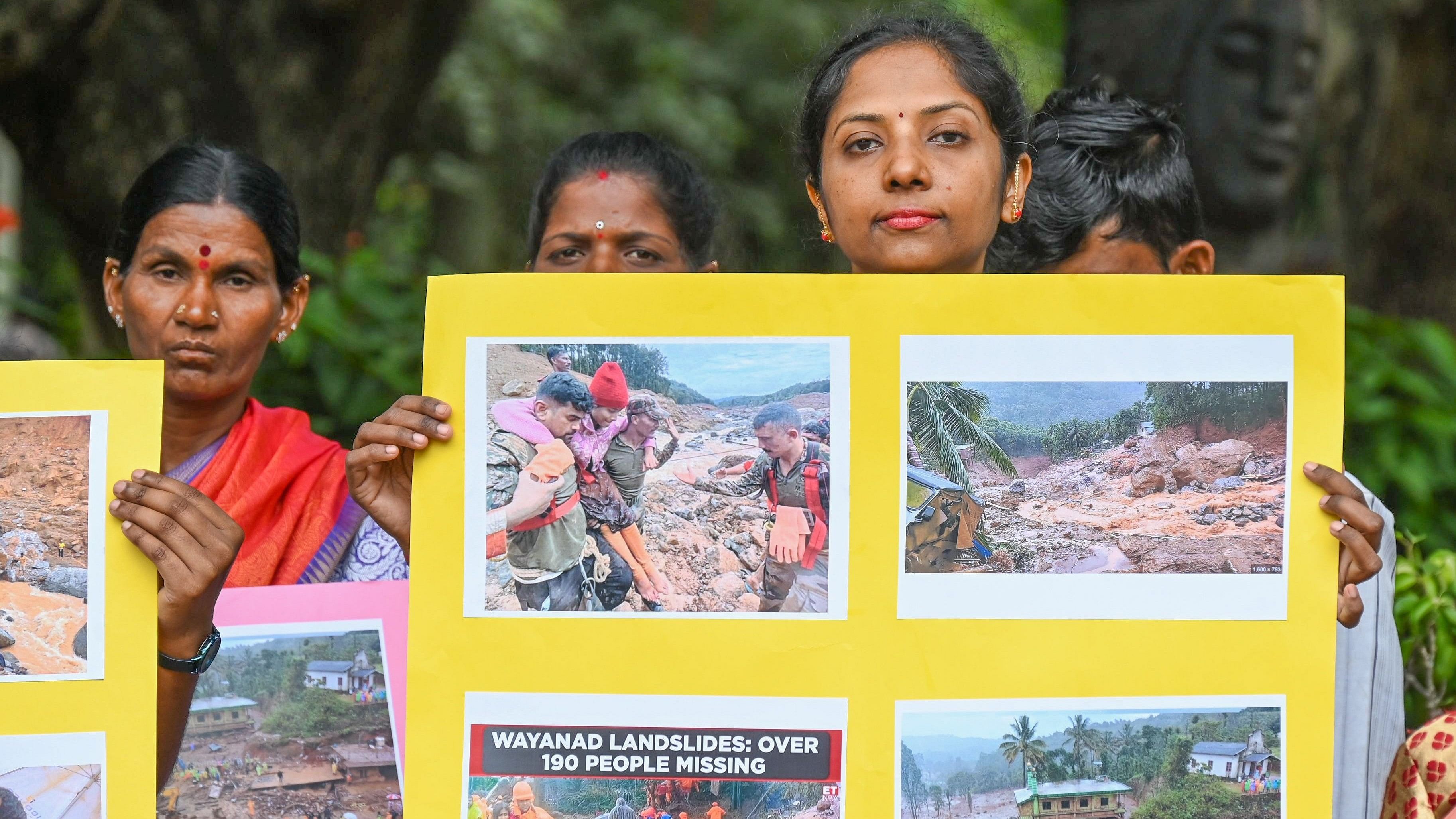 <div class="paragraphs"><p>Visitors to Cubbon Park display placards with images of the victims of the landslides in Wayanad, Kerala. </p></div>