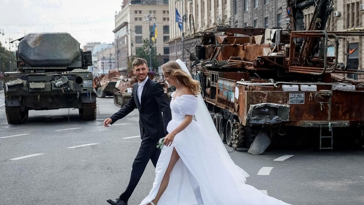 <div class="paragraphs"><p>Newlyweds visit an exhibition displaying destroyed Russian military vehicles located on the main street Khreshchatyk as part of the upcoming celebration of the Independence Day of Ukraine, amid Russia's invasion, in central Kyiv. Image for representation only.</p></div>