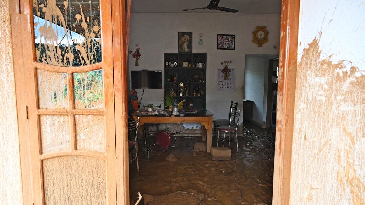 <div class="paragraphs"><p>A view inside a damaged house at a settlement 3km uphill from Mundakkai epicenter of the devastating landslide in Wayanad.</p></div>