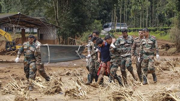 <div class="paragraphs"><p>Rescue operation underway after a landslide, in Wayanad.</p></div>