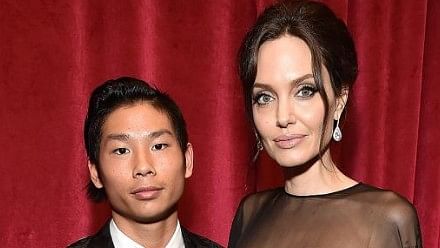 <div class="paragraphs"><p>Pax Thien Jolie-Pitt (L), son of former actor couple Angelina Jolie (R) and Brad Pitt.</p></div>