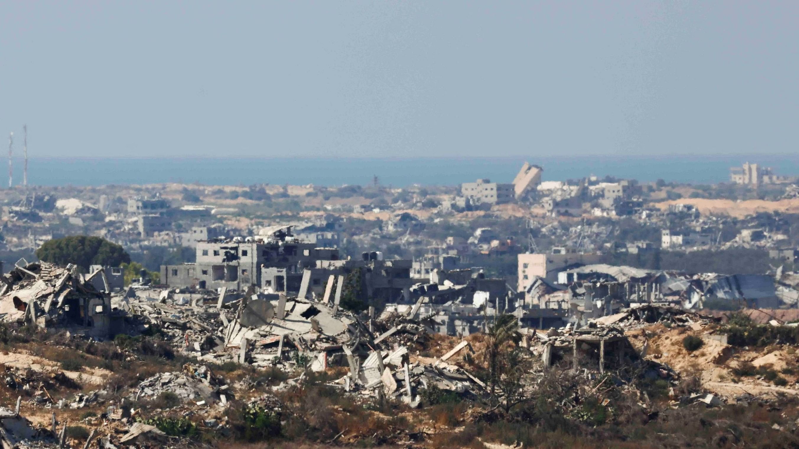 <div class="paragraphs"><p>A view of destroyed buildings in Gaza, amid the ongoing conflict between Israel and the Palestinian Islamist group Hamas, as seen from southern Israel August 1, 2024. </p></div>