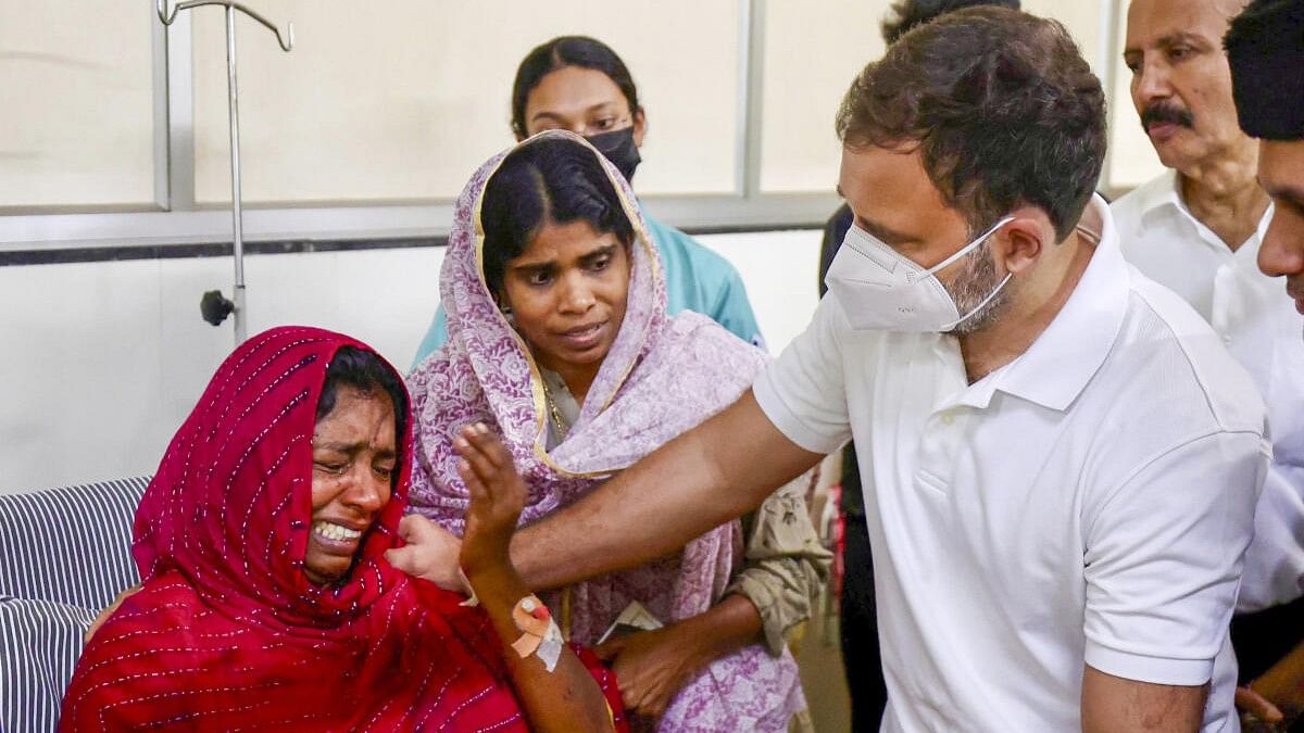 <div class="paragraphs"><p>Rahul Gandhi consoles people affected by the landslides at Meppadi in Wayanad.</p></div>