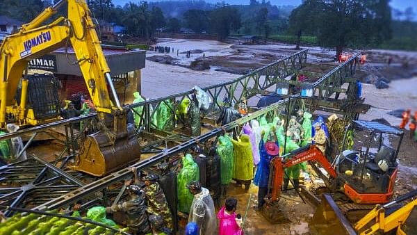 <div class="paragraphs"><p>Reconstruction of Bailey bridge underway that connects Mundakkai and Chooralmala and was washed away in the landslides triggered by heavy rain in the hilly areas of Wayanad district on Wednesday, July 31, 2024. </p></div>