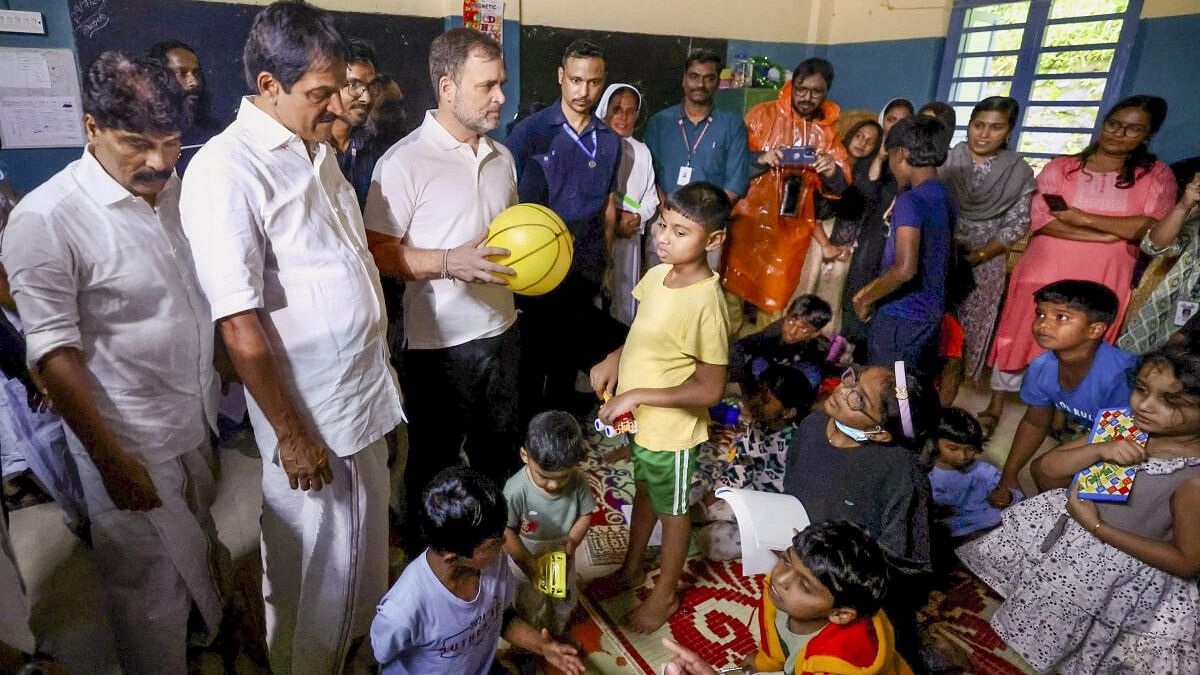 <div class="paragraphs"><p>Leader of Opposition in the Lok Sabha Rahul Gandhi with Congress leader K.C. Venugopal visits a relief camp for people affected by the landslides, at Meppadi in Wayanad district.</p></div>