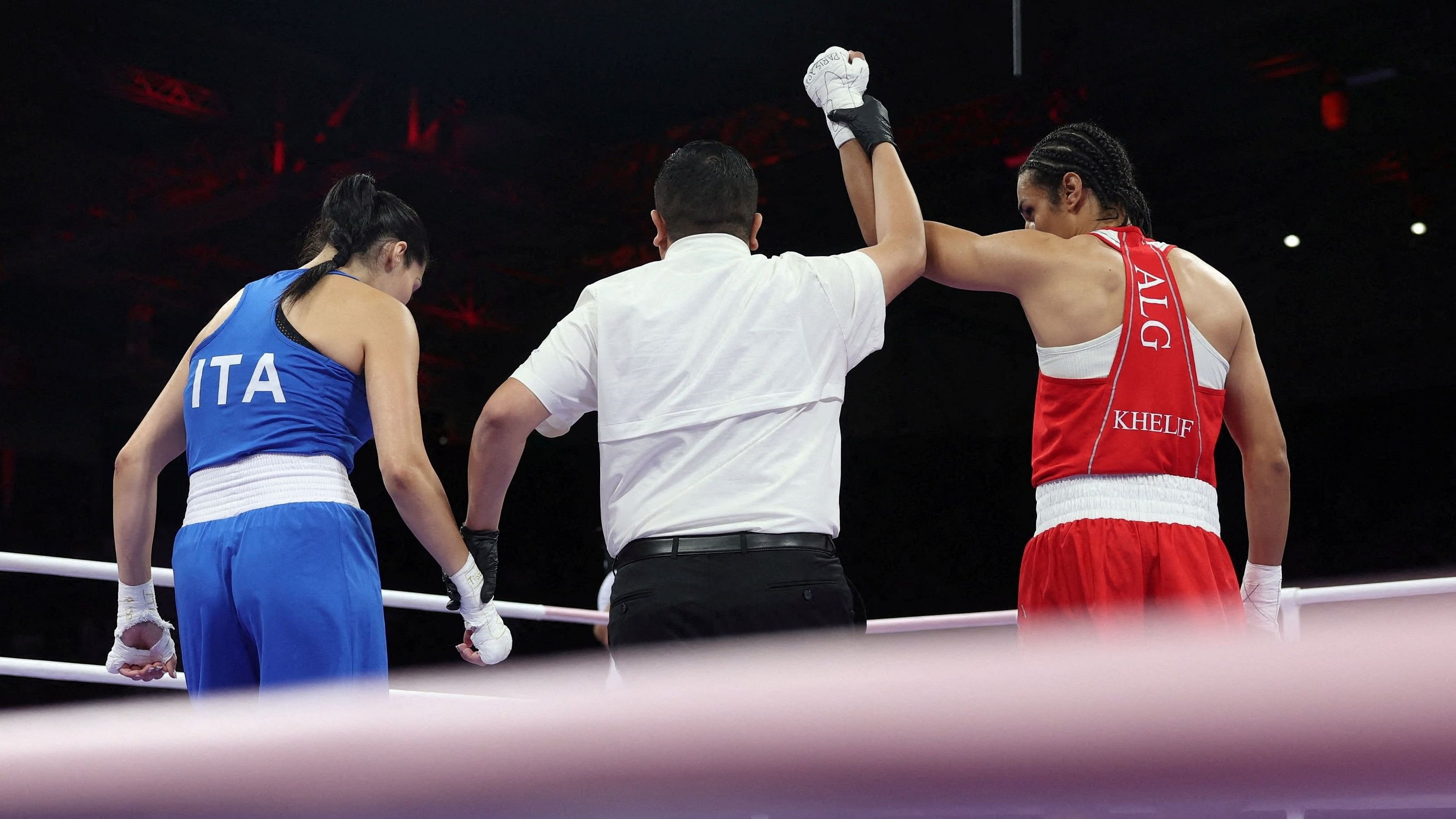 <div class="paragraphs"><p>Imane Khelif of Algeria has her hand raised after winning her fight against Angela Carini of Italy.</p></div>