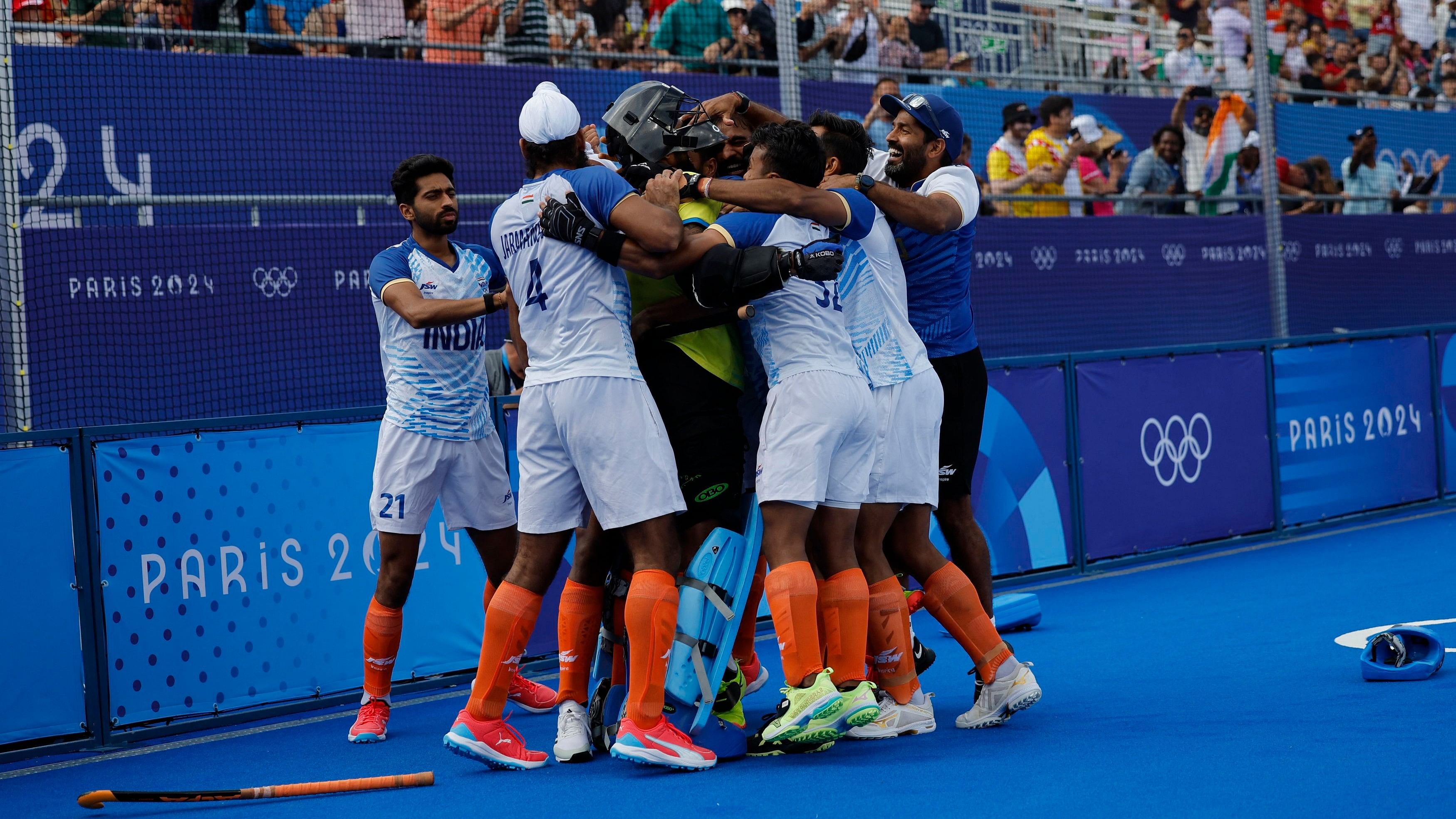 <div class="paragraphs"><p>Jarmanpreet Singh of India celebrates with teammates after winning the match against Great Britain, August 4, 2024.</p></div>