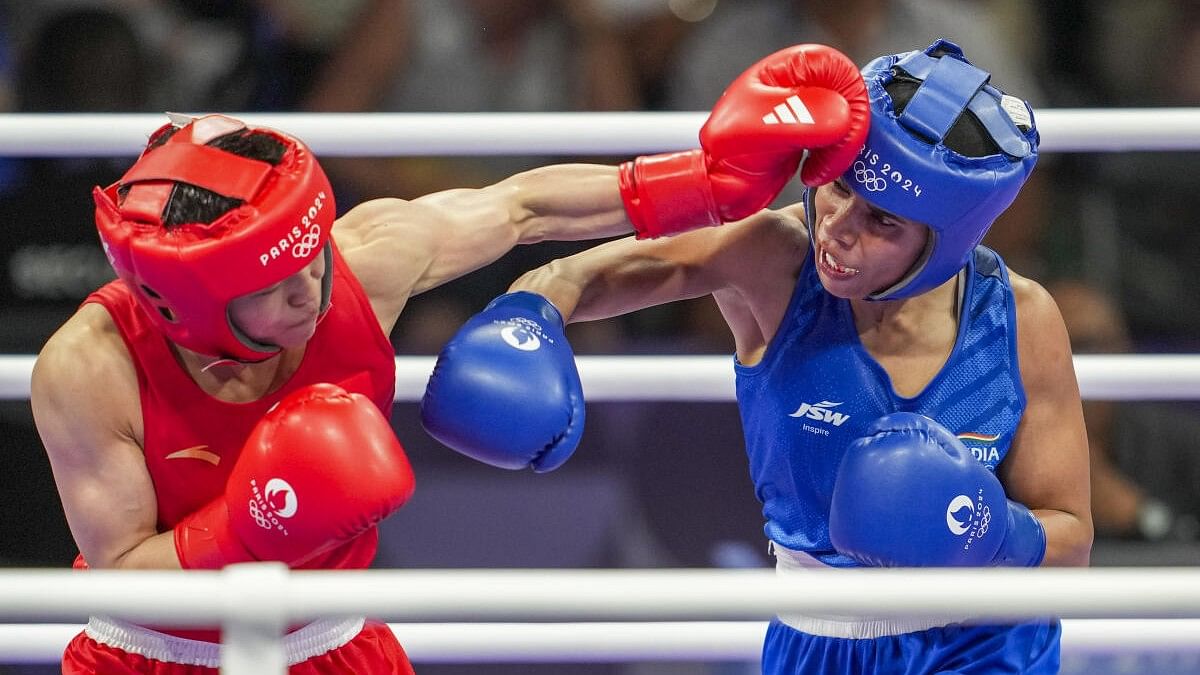 <div class="paragraphs"><p> Nikhat Zareen (in blue) and China's Wu Yu during their women’s 50kg Round of 16 boxing match at the 2024 Summer Olympics, in Paris, France, Thursday, August 1, 2024.</p></div>